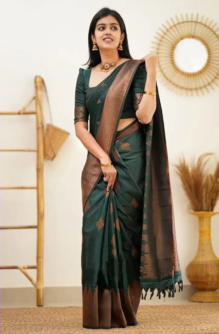 Kanjivaram art silk saree in a bottle green color