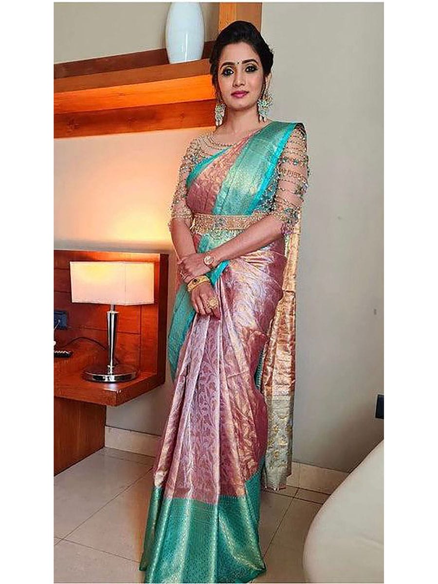 woman wearing an elegant Tissue Banarasi Silk Saree